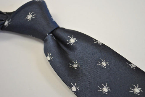 navy tie with white spider silhouette design
